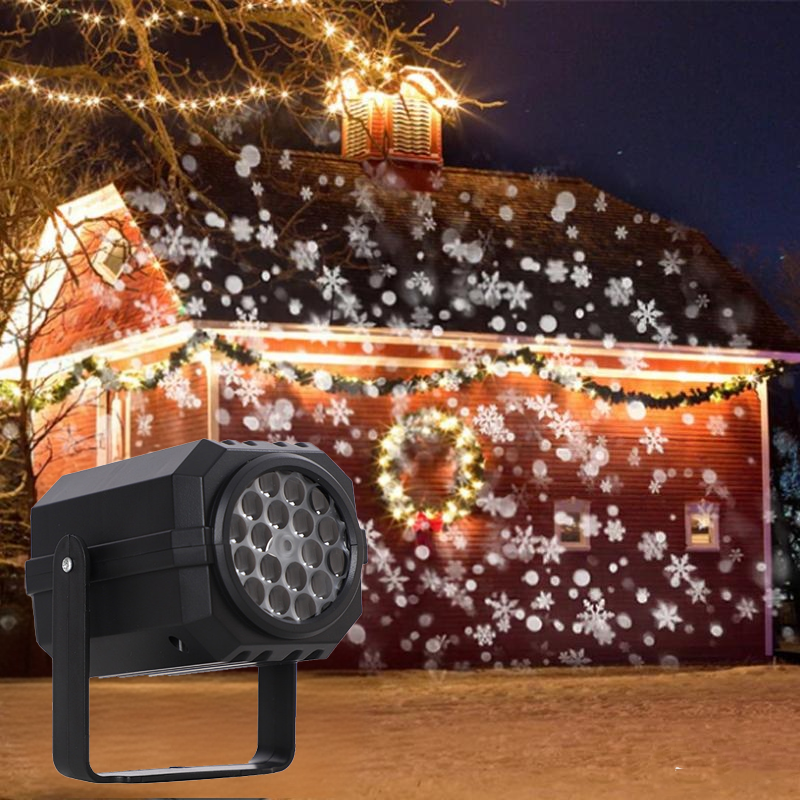 Rotating projector with LED lights creates a Christmas effect.